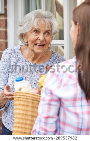 Person Doing Shopping For Elderly Neighbor