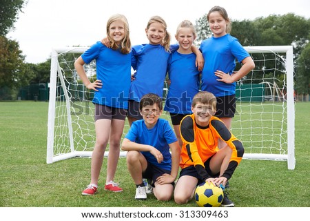 Boys And Girls In Elementary School Soccer Team