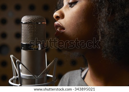 Female Vocalist In Recording Studio