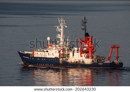 Kiel, Germany - July 21, 2013: The Poseidon, a research vessel of the Institute of Marine Sciences is leaving port in Kiel.