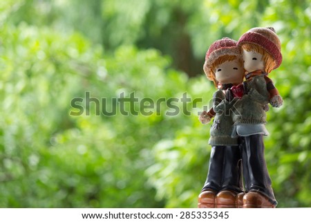 Two Dolls Winter Suit hug and holding Love Heart