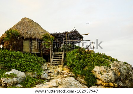 Huts with minimalism in mind on a beach in the Riviera Maya.