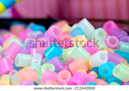 close Up of pixel beads, plastic granules or plastic beads