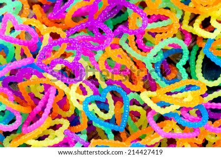 close up of color full elastic love heart shape loom bands rainbow color full