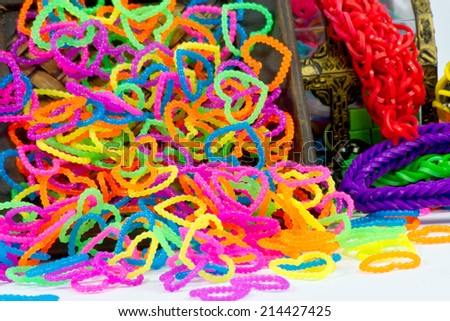 close up of color full elastic love heart shape loom bands rainbow color full