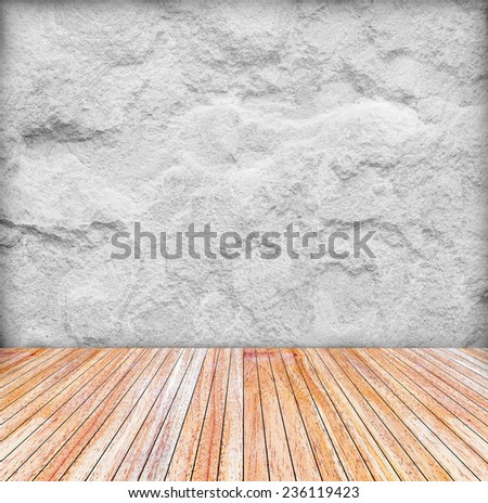 Backdrop sandstone wall and wood slabs arranged in perspective texture background in natural  patterns.
