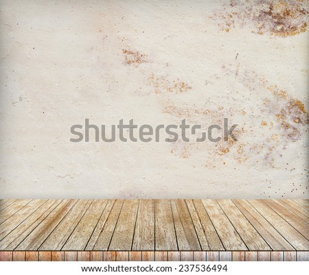 Backdrop sandstone wall and wood slabs arranged in perspective texture background in natural colors and patterns.