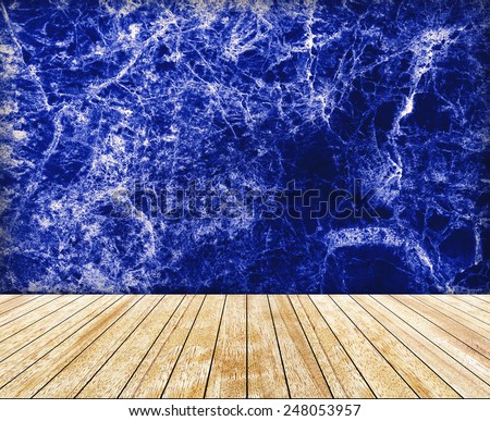 Backdrop  blue marble wall and wood slabs arranged in perspective texture background.