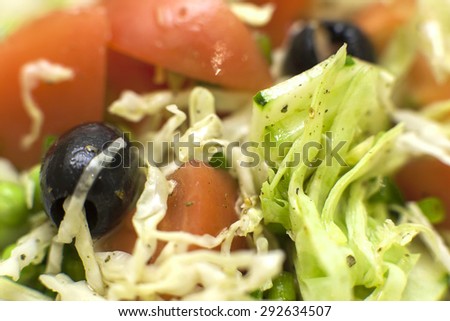 a fresh salad of tomatoes and Greek olives