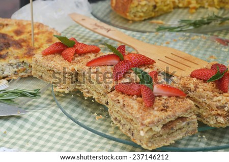 Napoleon cake decorated with strawberries
