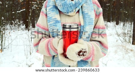 girl wrapped a blanket reading a book. winter concept.Christmas concept,