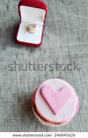 pink cupcakes, with cream ,decorated with hearts,Valentine\'s day,international women\'s day,love.Notepad
