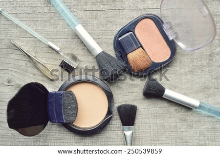 Makeup Eyeliner brush with bottle ,set of cosmetics,Make-up and brushes,powder, puff, mascara, eyeliner on wood table