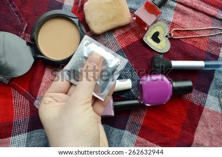Condoms, cosmetics, women\'s beautician, protection