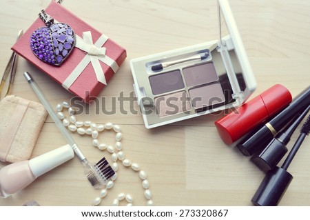 Makeup Eyeliner brush with bottle ,set of cosmetics,Make-up and brushes,powder, puff, mascara, eyeliner on wood table