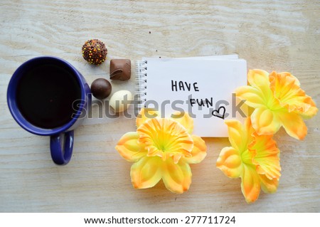 cup of hot coffee, notepad, wish good morning, flowers, candy