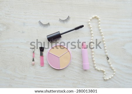 Makeup Eyeliner brush with bottle ,set of cosmetics,Make-up and brushes,powder, puff, mascara, eyeliner on wood table,false eyelashes,brush Century
