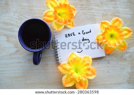 cup of hot coffee, notepad, wish good morning, flowers, candy
