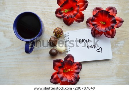 cup of hot coffee, notepad, wish good morning, flowers