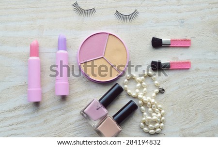 Makeup Eyeliner brush with bottle ,set of cosmetics,Make-up and brushes,powder, puff, mascara, eyeliner on wood table,false eyelashes,brush Century