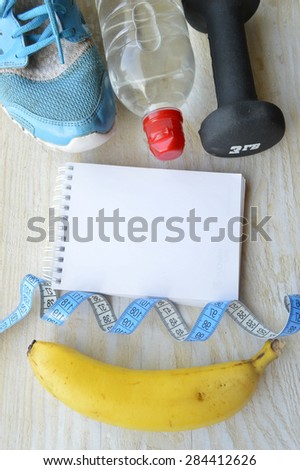 sneakers, centimeter.weight loss, running, healthy eating, healthy lifestyle concep.banana, water