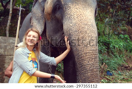 Colombo, Sri Lanka and January 17, 2014: Goofy SURF CAMP, Tourists on a safari ride on elephants