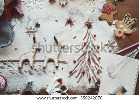 cooking, cooking Christmas ginger cookies, cupcakes. cookie cutters, deer, teapots. book recipes. the magic of Christmas kitchen. Happy New Year