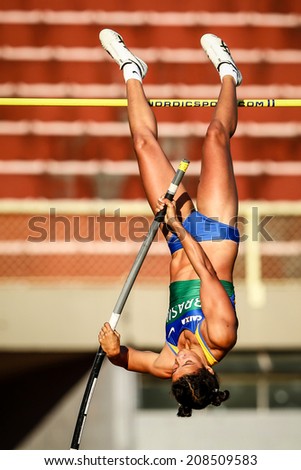 SAO PAULO, BRAZIL - AUGUST 1: Patricia dos Santos of Brazil competes in the Womens Pole Vault finals to win the gold medal at Ibirapuera Stadium during day one of the Ibero Americanos 2014 Athletics.