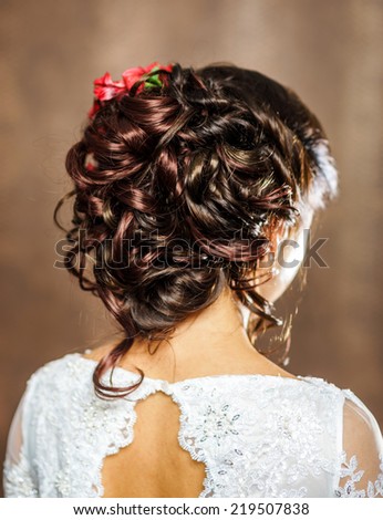 Beautiful bride with fashion wedding hairdress isolated