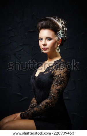 Beautiful bride with fashion wedding hair-style, studio portrait