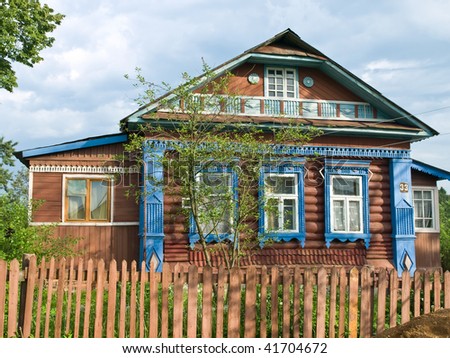 Colorized wooden house in russian country
