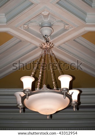 Gold chandelier in old house