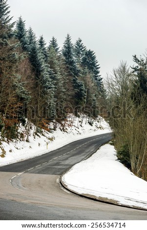 New asphalt auto road in Alsace mountains, France, winter