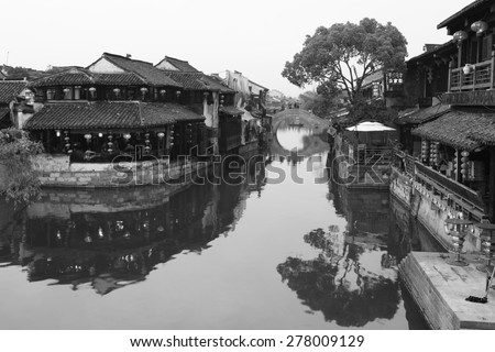 Xitang, China - April, 15, 2015: Xitang is a Famous Water Village in Zhejiang Province, China. Photo in Black and White Shows the Traditional Houses along the River.