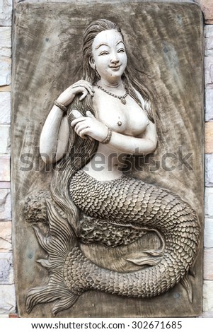 Mermaid statue carved plaster