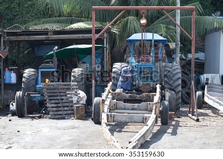 Repairing tractors