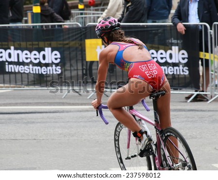 STOCKHOLM - AUG 23: Maria Ortega cycling in a curve in the Women\'s ITU World Triathlon series event August 23, 2014 in Stockholm, Sweden