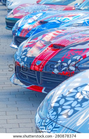 STOCKHOLM - MAY 23, 2015: Fronts of a number of powerful sports-car before the start of the public event Gumball 3000, May 23, 2015 in Stockholm, Sweden