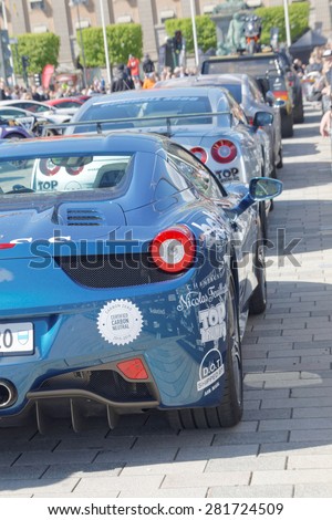 STOCKHOLM - MAY 23, 2015: Fast sports-cars parked before the start of the public event Gumball 3000, May 23, 2015 in Stockholm, Sweden