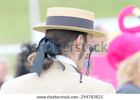 STOCKHOLM - JUNE 06, 2015: Man wearing an old felt hat at the hat parade at the horse race event  Nationaldags Galoppen at Gardet. June 6, 2015 in Stockholm