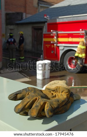 Firefighters work gloves. Selective focus on gloves.