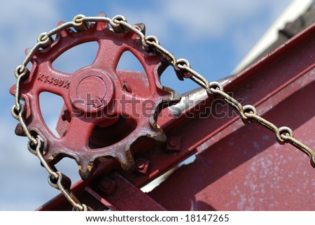 Abstract of an antique machine sprocket. Selective focus.