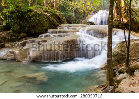 Beautiful cascade waterfall in deep evergreen forest, Erawan National Park in Kanchanaburi, Thailand
