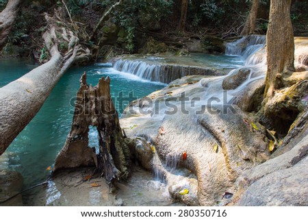 Beautiful cascade waterfall in deep evergreen forest, Erawan National Park in Kanchanaburi, Thailand