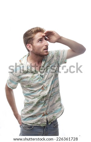 ginger young man with hawaiian shirtginger young man with hawaiian shirt looking far
