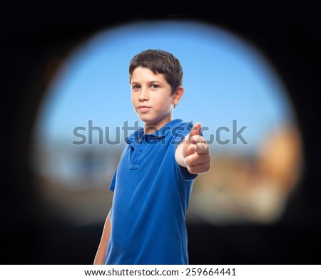 boy pointing at you with gun gsture
