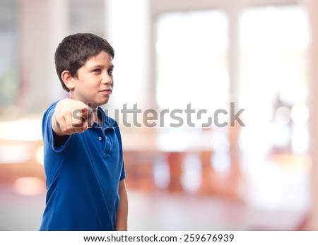 boy pointing at you in a school
