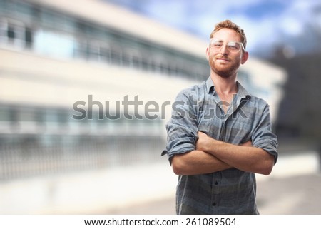 ginger young man with shirt and glasses