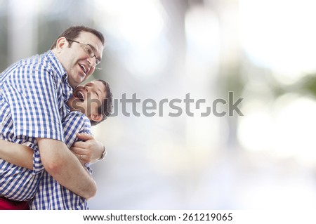 father and son hugging