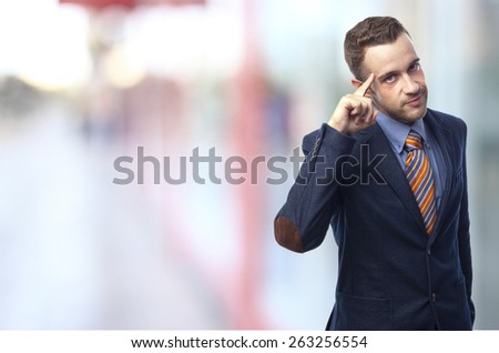 Man in suit self-confidence in front of an office